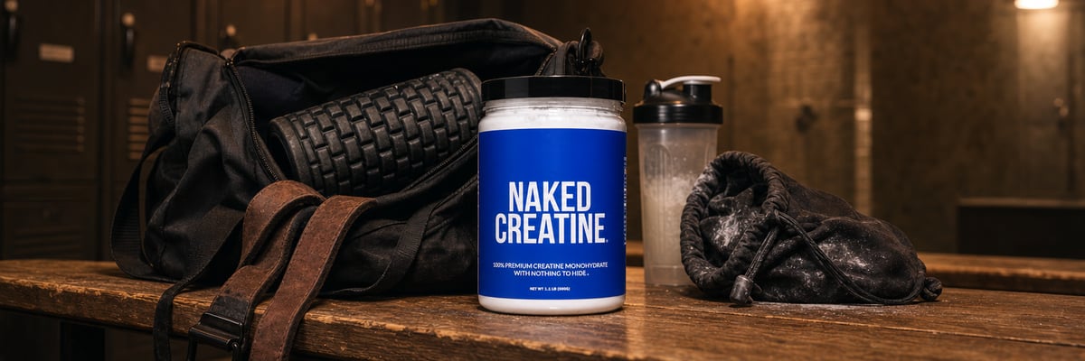 Naked Creatine tub in a gym bag on a locker room bench surrounded by workout gear